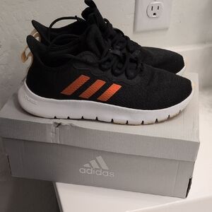 Adidas Women's Black Sneakers with Orange Stripes